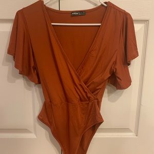 Burnt orange bodysuit